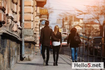 Couple walking away on the street